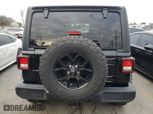 2022 Jeep Wrangler Unlimited High Tide with VIN 1C4HJXDG4NW179888, listed as a Copart auction lot 82601624 with 15,631 mi miles and Salvage Title. Bid and sale history available at DreamBid. Image 6.