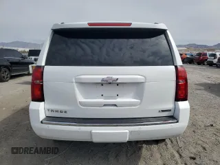 2018 Chevrolet Tahoe Premier with VIN 1GNSKCKC6JR195246, listed as a Copart auction lot 54887165 with 135,973 mi miles and Salvage title. Bid and sale history available at DreamBid. Image 6.