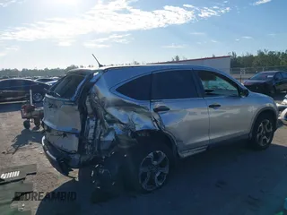 2014 Honda CR-V LX with VIN 3CZRM3H35EG708060, listed as a IAAI auction lot 41761003 with 142,954 mi miles. Bid and sale history available at carsss.com. Image 6.