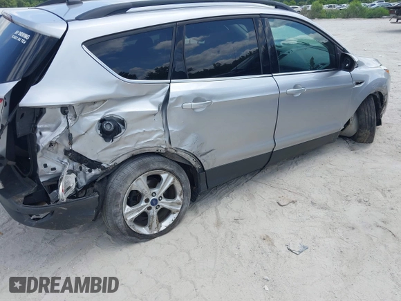 2014 Ford Escape SE with VIN 1FMCU9G9XEUD91390, listed as a IAAI auction lot 42561849 with 319,400 mi miles and . Bid and sale history available at DreamBid. Image 4.