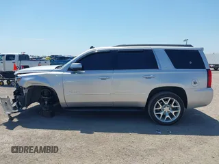 2015 Chevrolet Tahoe LT with VIN 1GNSCBKC6FR303850, listed as a IAAI auction lot 42254115 with 147,856 mi miles and . Bid and sale history available at DreamBid. Image 14.