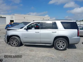 2015 GMC Yukon SLT z VIN 1GKS2BKC0FR100064, wystawiony jako IAAI lot #41941462 z przebiegiem 136 740 mil mil oraz . Historia ofert i sprzedaży dostępna na DreamBid. Obrazek 14.