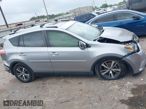 2018 Toyota RAV4 XLE with VIN JTMWFREV7JJ203609, listed as a IAAI auction lot 41938100 with 51,021 mi miles. Bid and sale history available at carsss.com. Image 13.