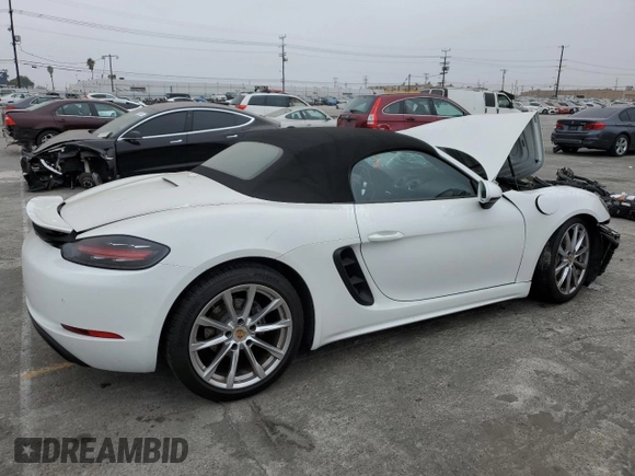 2019 Porsche 718 Boxster z VIN WP0CA2A80KS211040, wystawiony jako Copart lot #76409354 z przebiegiem 27 669 mil mil oraz Szkoda całkowita • Salvage title. Historia ofert i sprzedaży dostępna na DreamBid. Obrazek 3.