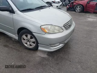 2003 Toyota Corolla CE with VIN 2T1BR32E13C038971, listed as a IAAI auction lot 42027458 with 227,808 mi miles. Bid and sale history available at carsss.com. Image 6.
