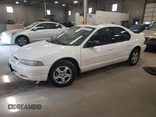 1999 Dodge Stratus z VIN 1B3EJ56H7XN504802, wystawiony jako Copart lot #48618165 z przebiegiem 88 799 mil mil oraz Tytuł czysty. Historia ofert i sprzedaży dostępna na DreamBid. Obrazek 1.