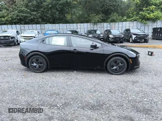 2024 Toyota Prius LE z VIN JTDADABU4R3013862, wystawiony jako Copart lot #74573904 z przebiegiem 6 mil mil oraz Czysty tytuł • Clean title. Historia ofert i sprzedaży dostępna na DreamBid. Obrazek 13.