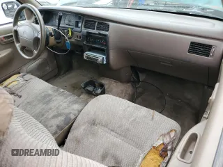 1996 Toyota T100 DX z VIN JT4TN12D2T0026690, wystawiony jako Copart lot #52937955 z przebiegiem 287 729 mil mil oraz Tytuł czysty. Historia ofert i sprzedaży dostępna na DreamBid. Obrazek 8.