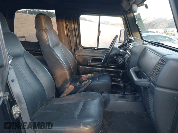 2004 Jeep Wrangler SE with VIN 1J4FA29184P762210, listed as a IAAI auction lot 40983051 with 107,525 mi miles and . Bid and sale history available at DreamBid. Image 5.