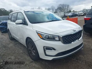 2021 Kia Sedona LX with VIN KNDMB5C11M6671063, listed as a IAAI auction lot 41951433 with 130,891 mi miles. Bid and sale history available at carsss.com. Image 1.