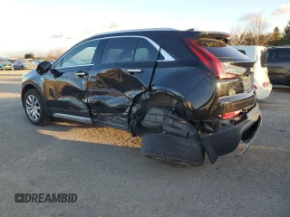2022 Cadillac XT4 AWD Premium Luxury with VIN 1GYFZDR45NF109999, listed as a Copart auction lot 84618914 with 66,697 mi miles and Clean title. Bid and sale history available at DreamBid. Image 2.