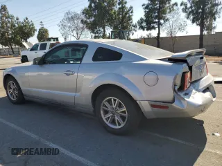 2005 Ford Mustang Deluxe with VIN 1ZVFT80N955168643, listed as a Copart auction lot 62854705 with 132,806 mi miles and Salvage title. Bid and sale history available at DreamBid. Image 2.