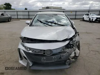 2021 Toyota Prius LE with VIN JTDKAMFP5M3192991, listed as a Copart auction lot 56768095 with 77,515 mi miles and Salvage title. Bid and sale history available at DreamBid. Image 5.