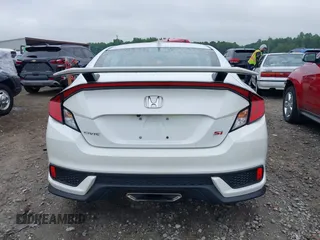 2018 Honda Civic Si z VIN 2HGFC3A52JH751998, wystawiony jako IAAI lot #42415499 z przebiegiem 58 088 mil mil oraz . Historia ofert i sprzedaży dostępna na DreamBid. Obrazek 16.