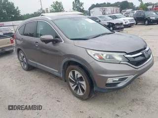 2015 Honda CR-V Touring z VIN 5J6RM3H99FL002315, wystawiony jako IAAI lot #42364421 z przebiegiem 94 018 mil mil oraz . Historia ofert i sprzedaży dostępna na DreamBid. Obrazek 1.