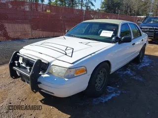 2005 Ford Police Interceptor z VIN 2FAFP71WX5X164985, wystawiony jako IAAI lot #41363721 z przebiegiem 147 950 mil mil oraz . Historia ofert i sprzedaży dostępna na DreamBid. Obrazek 17.