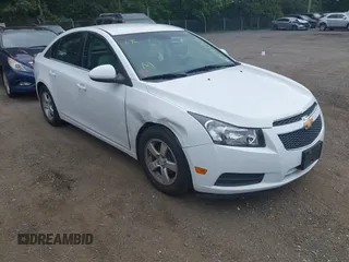2014 Chevrolet Cruze 1LT z VIN 1G1PC5SB6E7192324, wystawiony jako IAAI lot #42783725 z przebiegiem 191 784 mil mil oraz . Historia ofert i sprzedaży dostępna na DreamBid. Obrazek 1.