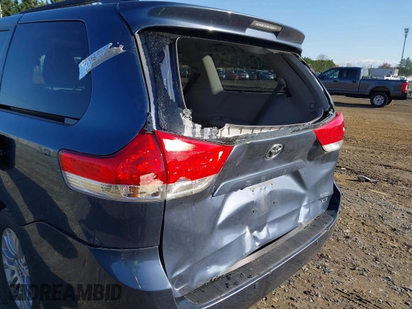 2014 Toyota Sienna XLE with VIN 5TDYK3DC2ES431320, listed as a IAAI auction lot 41977059 with 158,711 mi miles and . Bid and sale history available at DreamBid. Image 6.
