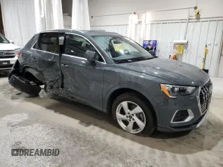 2022 Audi Q3 Premium with VIN WA1AUCF33N1002302, listed as a Copart auction lot 51973985 with 49,886 mi miles and Salvage title. Bid and sale history available at DreamBid. Image 4.