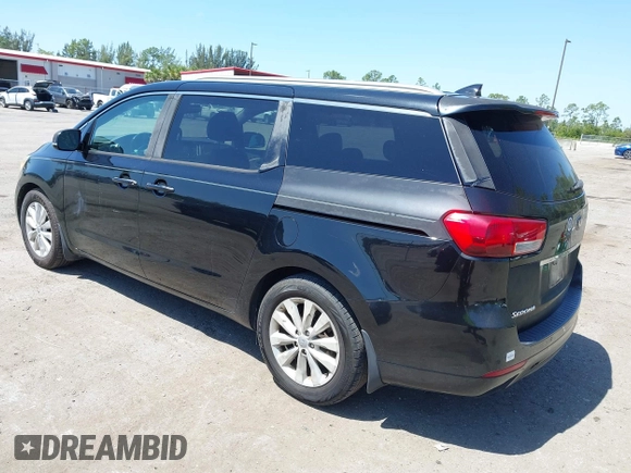 2016 Kia Sedona SX with VIN KNDMC5C15G6143818, listed as a IAAI auction lot 42051284 with 97,666 mi miles and . Bid and sale history available at carsss.com. Image 3.