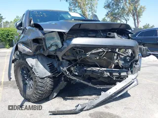 2021 Toyota Tacoma SR z VIN 5TFCZ5AN1MX274315, wystawiony jako IAAI lot #42273054 z przebiegiem 67 863 mil mil oraz . Historia ofert i sprzedaży dostępna na DreamBid. Obrazek 6.