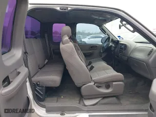 2003 Ford F-150 XL with VIN 1FTRX07253KB95404, listed as a IAAI auction lot 41945734 with 1 mi miles. Bid and sale history available at carsss.com. Image 5.