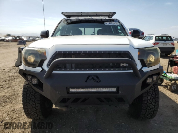 2014 Toyota Tacoma with VIN 3TMLU4EN7EM144839, listed as a Copart auction lot 52728065 with 32,610 mi miles and Salvage Title. Bid and sale history available at DreamBid. Image 5.