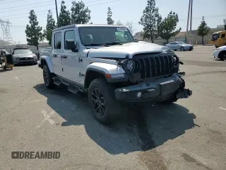 2022 Jeep Gladiator Altitude с VIN 1C6HJTAG1NL164724, выставлен на аукционе Copart как лот 62400065 с пробегом 46 993 миль миль и Списание • Salvage title. История ставок и продаж доступна на DreamBid. Изображение 14.
