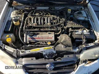 2001 Nissan Maxima SE 20th Anniversary. z VIN JN1CA31A81T313061, wystawiony jako Copart lot #72608504 z przebiegiem 200 484 mil mil oraz Szkoda całkowita • Salvage title. Historia ofert i sprzedaży dostępna na DreamBid. Obrazek 11.