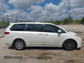 2016 Toyota Sienna XLE with VIN 5TDYK3DC4GS702638, listed as a IAAI auction lot 42255793 with 124,977 mi miles and . Bid and sale history available at DreamBid. Image 13.