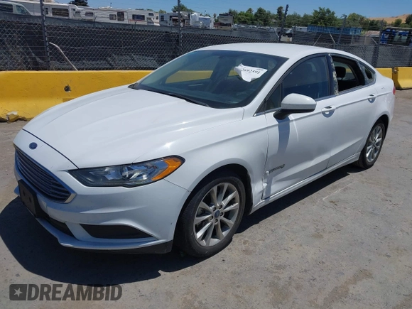 2017 Ford Fusion Hybrid SE with VIN 3FA6P0LU3HR326980, listed as a IAAI auction lot 42692591 with 141,122 mi miles and . Bid and sale history available at DreamBid. Image 2.