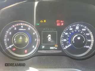 2016 Hyundai Azera Limited z VIN KMHFH4JG0GA507938, wystawiony jako Copart lot #56144255 z przebiegiem 69 871 mil mil oraz Szkoda całkowita • Salvage title. Historia ofert i sprzedaży dostępna na DreamBid. Obrazek 9.