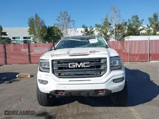 2016 GMC Sierra 1500 SLT with VIN 3GTU2NEC2GG244329, listed as a IAAI auction lot 40810002 with 121,716 mi miles. Bid and sale history available at carsss.com. Image 12.