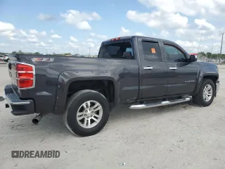 2014 Chevrolet Silverado 1500 LT with VIN 1GCRCREC3EZ180387, listed as a Copart auction lot 56360345 with 134,306 mi miles and Salvage Title. Bid and sale history available at DreamBid. Image 3.