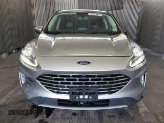2021 Ford Escape Titanium Plug-In Hybrid z VIN 1FMCU0LZ8MUA66995, wystawiony jako Copart lot #60986765 z przebiegiem 69 609 mil mil oraz Czysty tytuł • Clean title. Historia ofert i sprzedaży dostępna na DreamBid. Obrazek 5.