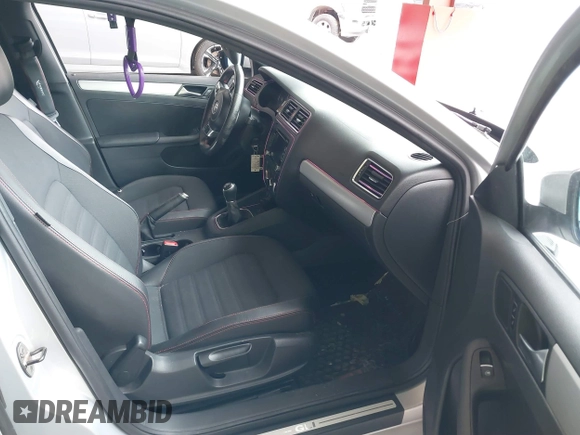 2012 Volkswagen Jetta GLI Autobahn z VIN 3VW567AJ1CM460223, wystawiony jako IAAI lot #41712037 z przebiegiem 132 172 mil mil oraz . Historia ofert i sprzedaży dostępna na DreamBid. Obrazek 5.