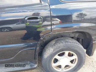 2005 GMC Yukon Denali z VIN 1GKEK63U55J105401, wystawiony jako IAAI lot #41857659 z przebiegiem 265 877 mil mil oraz . Historia ofert i sprzedaży dostępna na DreamBid. Obrazek 13.