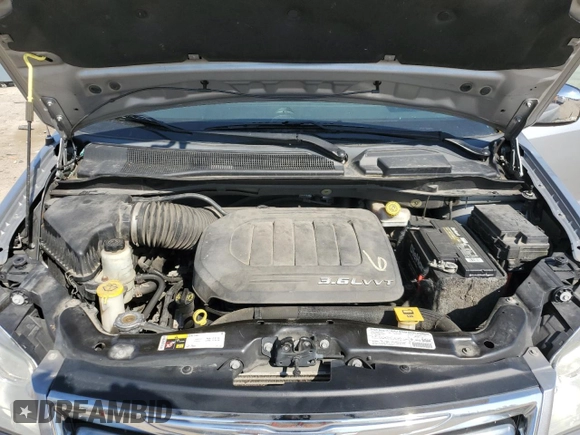 2013 Chrysler Town & Country Touring L with VIN 2C4RC1CG7DR647830, listed as a Copart auction lot 47555005 with 91,284 mi miles and Salvage Title. Bid and sale history available at DreamBid. Image 12.