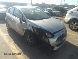 2019 Ford Fiesta SE with VIN 3FADP4EJ2KM123973, listed as a IAAI auction lot 41288840 with 107,959 mi miles and . Bid and sale history available at DreamBid. Image 1.