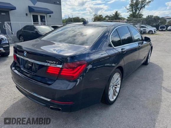 2015 BMW 7 Series 750i xDrive with VIN WBAYB6C5XFD965910, listed as a Copart auction lot 55407895 with 173,486 mi miles and Salvage Title. Bid and sale history available at carsss.com. Image 3.