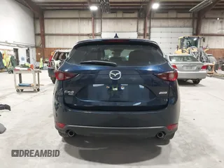 2018 Mazda CX-5 Touring with VIN JM3KFBCM5J0434716, listed as a IAAI auction lot 41738956 with 108,264 mi miles and . Bid and sale history available at DreamBid. Image 17.