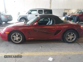 2006 Porsche Boxster z VIN WP0CA29806S710303, wystawiony jako IAAI lot #42276368 z przebiegiem 73 796 mil mil oraz . Historia ofert i sprzedaży dostępna na DreamBid. Obrazek 14.