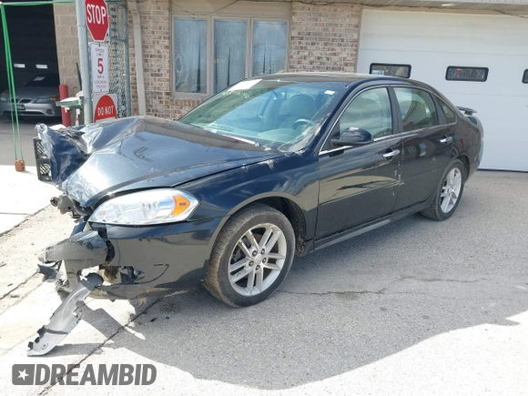 2012 Chevrolet Impala LTZ with VIN 2G1WC5E38C1185191, listed as a IAAI auction lot 41877040 with 99,315 mi miles and . Bid and sale history available at DreamBid. Image 17.