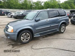2005 Suzuki XL7 LX z VIN JS3TX92V554109674, wystawiony jako Copart lot #59047645 z przebiegiem 150 742 mil mil oraz Szkoda całkowita • Salvage title. Historia ofert i sprzedaży dostępna na DreamBid. Obrazek 1.