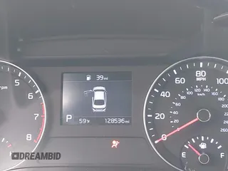 2019 Kia Forte LXS z VIN 3KPF24AD6KE041448, wystawiony jako IAAI lot #42035571 z przebiegiem 128 536 mil mil oraz . Historia ofert i sprzedaży dostępna na DreamBid. Obrazek 7.