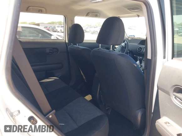 2012 Scion xB z VIN JTLZE4FE1CJ018190, wystawiony jako IAAI lot #41975106 z przebiegiem 117 994 mil mil oraz . Historia ofert i sprzedaży dostępna na DreamBid. Obrazek 8.
