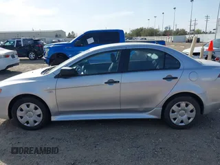 2010 Mitsubishi Lancer DE with VIN JA32U1FU4AU015574, listed as a IAAI auction lot 41770332 with 125,458 mi miles. Bid and sale history available at carsss.com. Image 13.