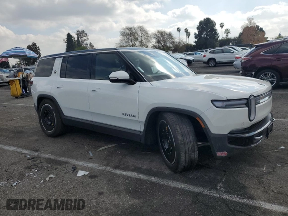 2025 Rivian R1S Adventure z VIN 7PDSGBBA1SN051768, wystawiony jako Copart lot #43838115 z przebiegiem 4875 mil mil oraz Szkoda całkowita • Salvage title. Historia ofert i sprzedaży dostępna na DreamBid. Obrazek 4.