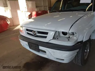 2002 Mazda B-Series 2WD Truck DS with VIN 4F4YR16V42TM25828, listed as a IAAI auction lot 41440414 with 132,334 mi miles. Bid and sale history available at carsss.com. Image 6.
