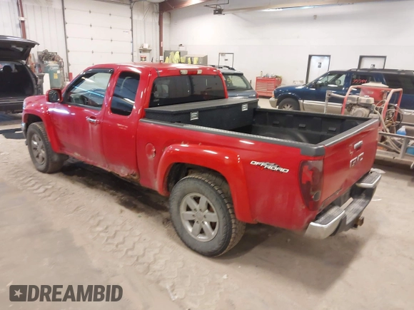 2011 GMC Canyon z VIN 1GTJ6NFE1B8109333, wystawiony jako IAAI lot #42035352 z przebiegiem 135 403 mil mil oraz . Historia ofert i sprzedaży dostępna na DreamBid. Obrazek 3.